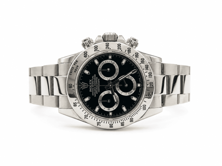 Rolex Daytona dial inspected under a loupe